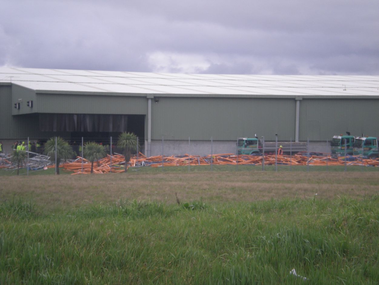 Christchurch Earthquake Discarding Broken Racking Outside Warehouse 96Dpi